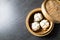 è‚‰ã¾ã‚“. steamed pork bun. Chinese Traditional cuisine concept. Dumplings Dim Sum in bamboo steamer with text copy space. Asian